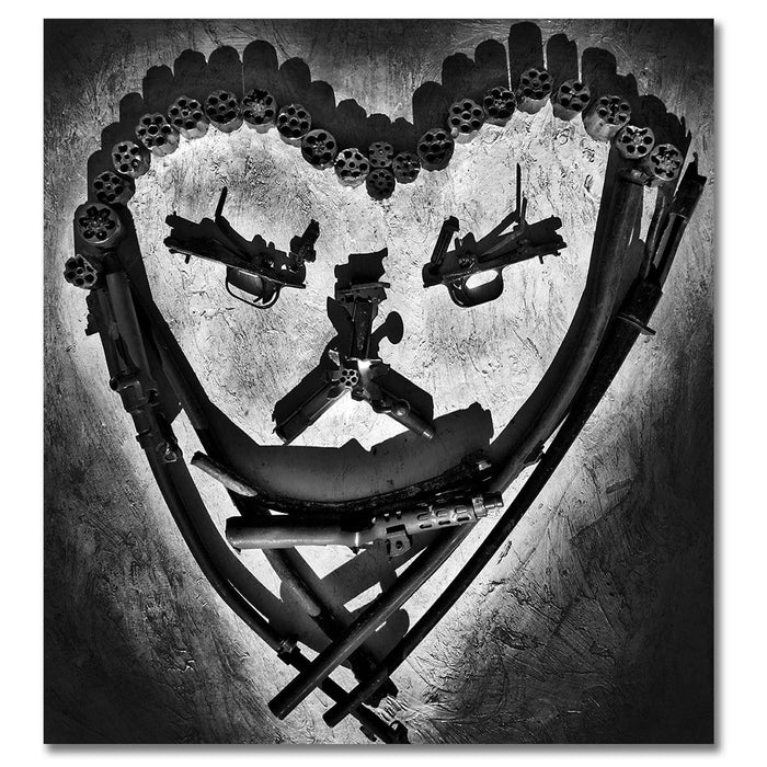 The Heart, Photo is made using crushed guns taken off the street by the police. Photograph The American Artist   
